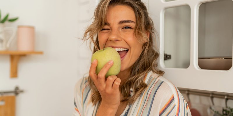 woman-eating-apple-2021-09-03-16-18-47-utc
