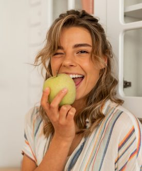 woman-eating-apple-2021-09-03-16-18-47-utc